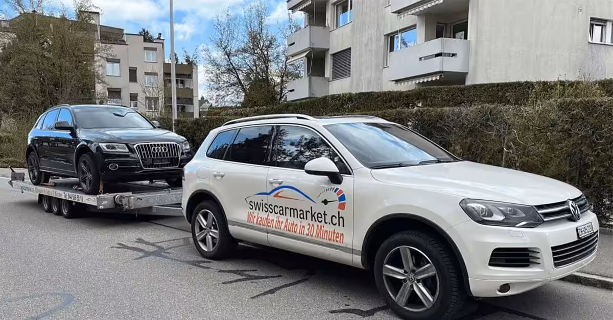 Hero für ankauf auto in Zürich mit moderner Fahrzeugreihe vor Glasfassade
